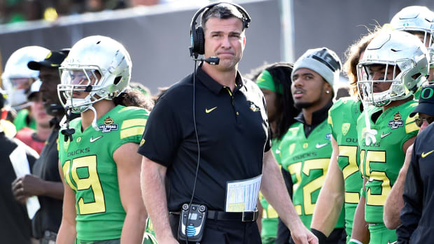 mario-cristobal-alex-mirabal-oregon-offensive-line-coach.jpg